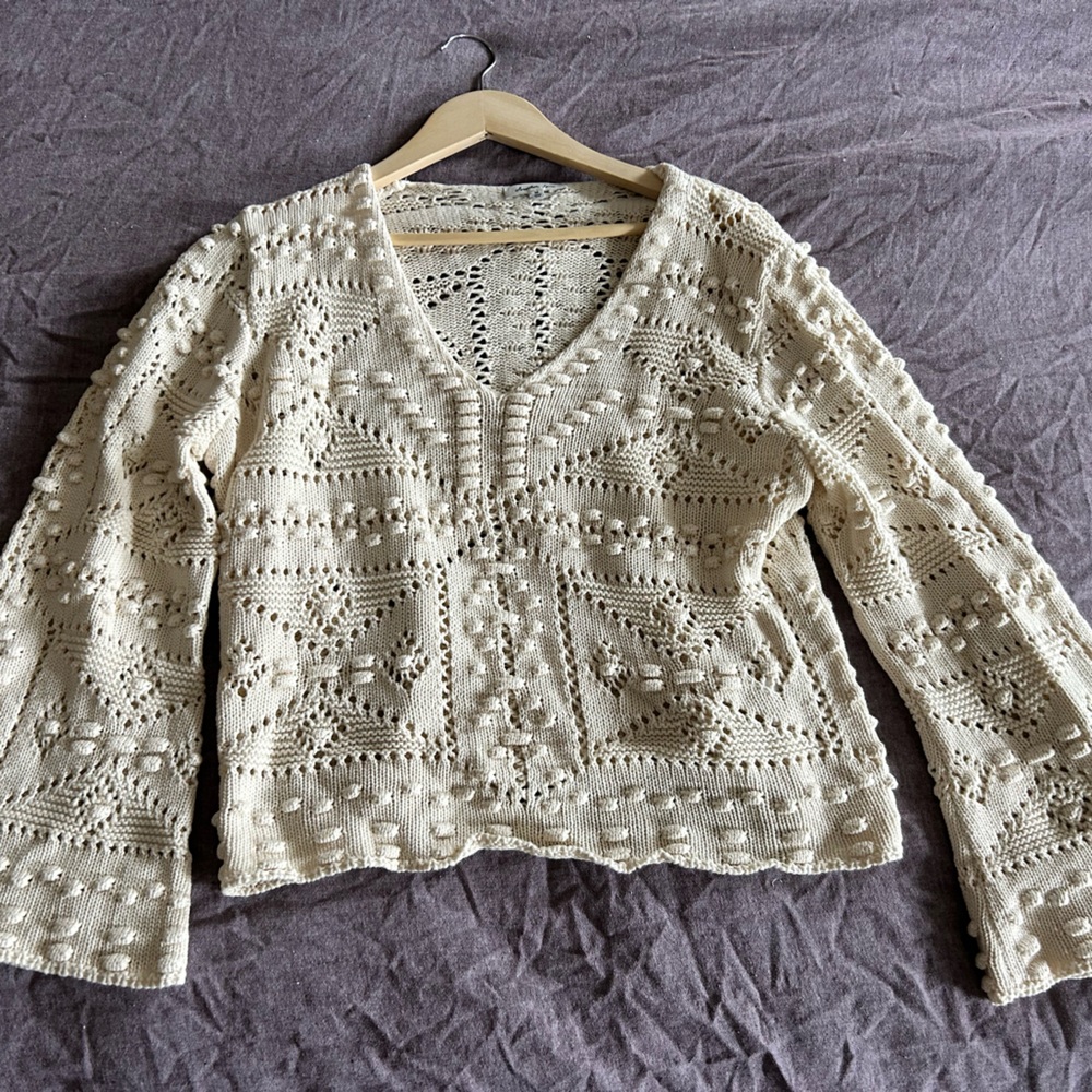 Beautiful crocheted top. Never worn new with tags.